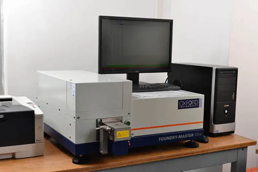 Using a spectrum analyzer to inspect the chemical composition and verify that the material meets the specified requirements.-2